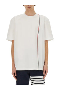 Thom Browne men’s white cotton jersey shirt with vertical red white and blue stripe detail on the side