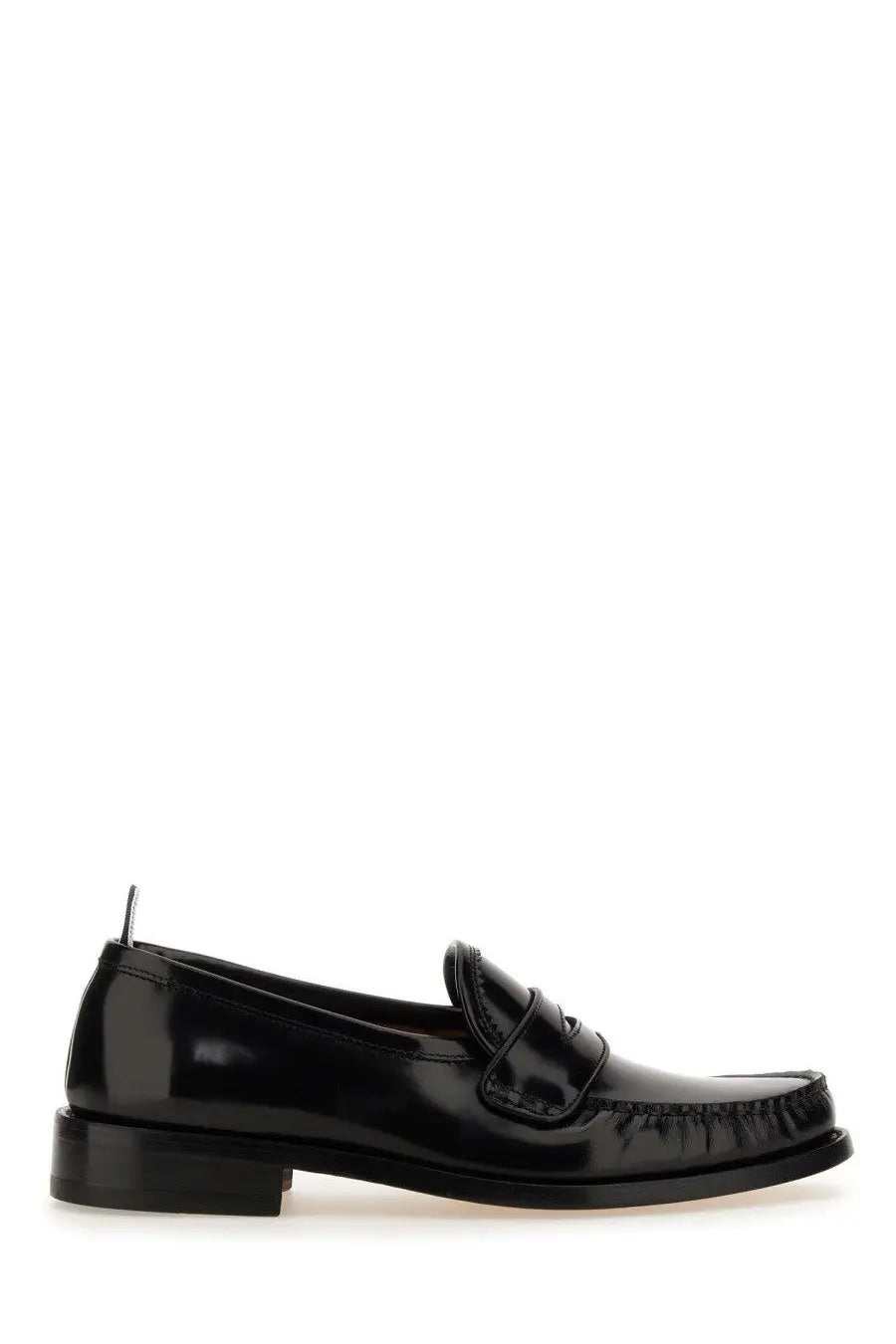 Thom Browne men’s black leather loafer in patent leather with a glossy finish and stitched detailing