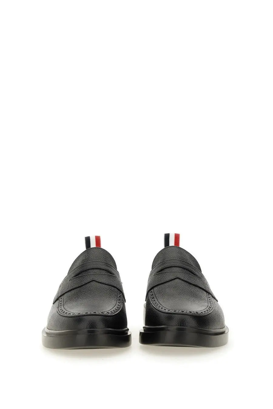 Thom browne men’s moccasin penny black black leather loafers with classic broguing and striped pull tabs at the heel