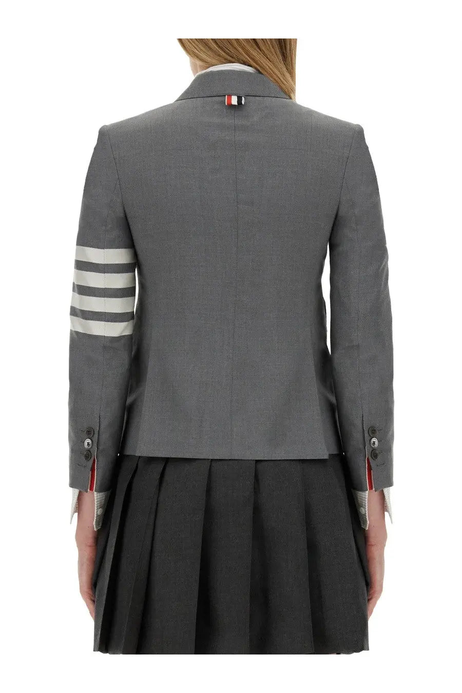Thom Browne women’s single breasted gray wool blazer with three white sleeve stripes and red white blue logo at collar