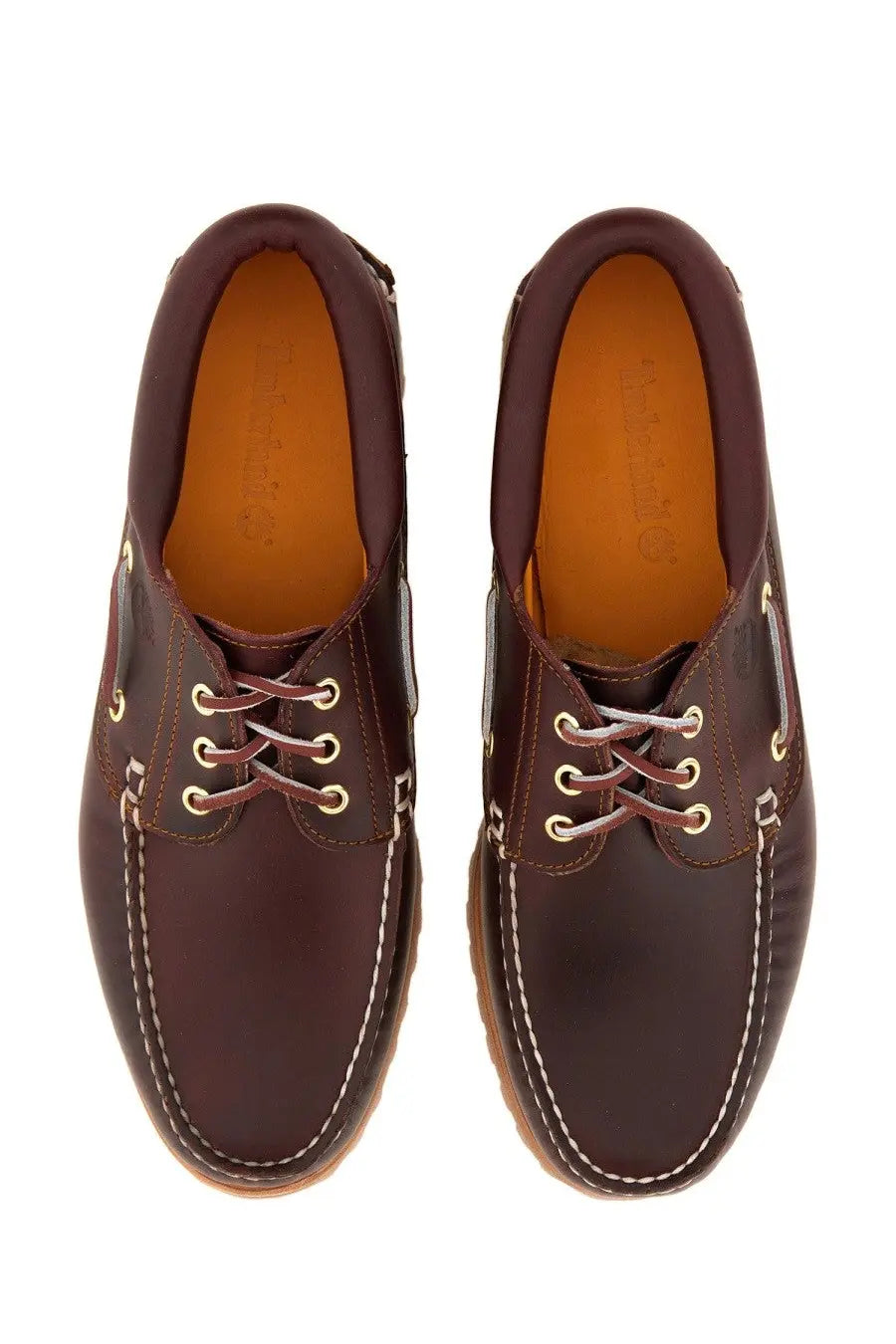 Timberland men’s authentic boat moccasin brown leather boat shoes with white stitching and gold tone eyelets