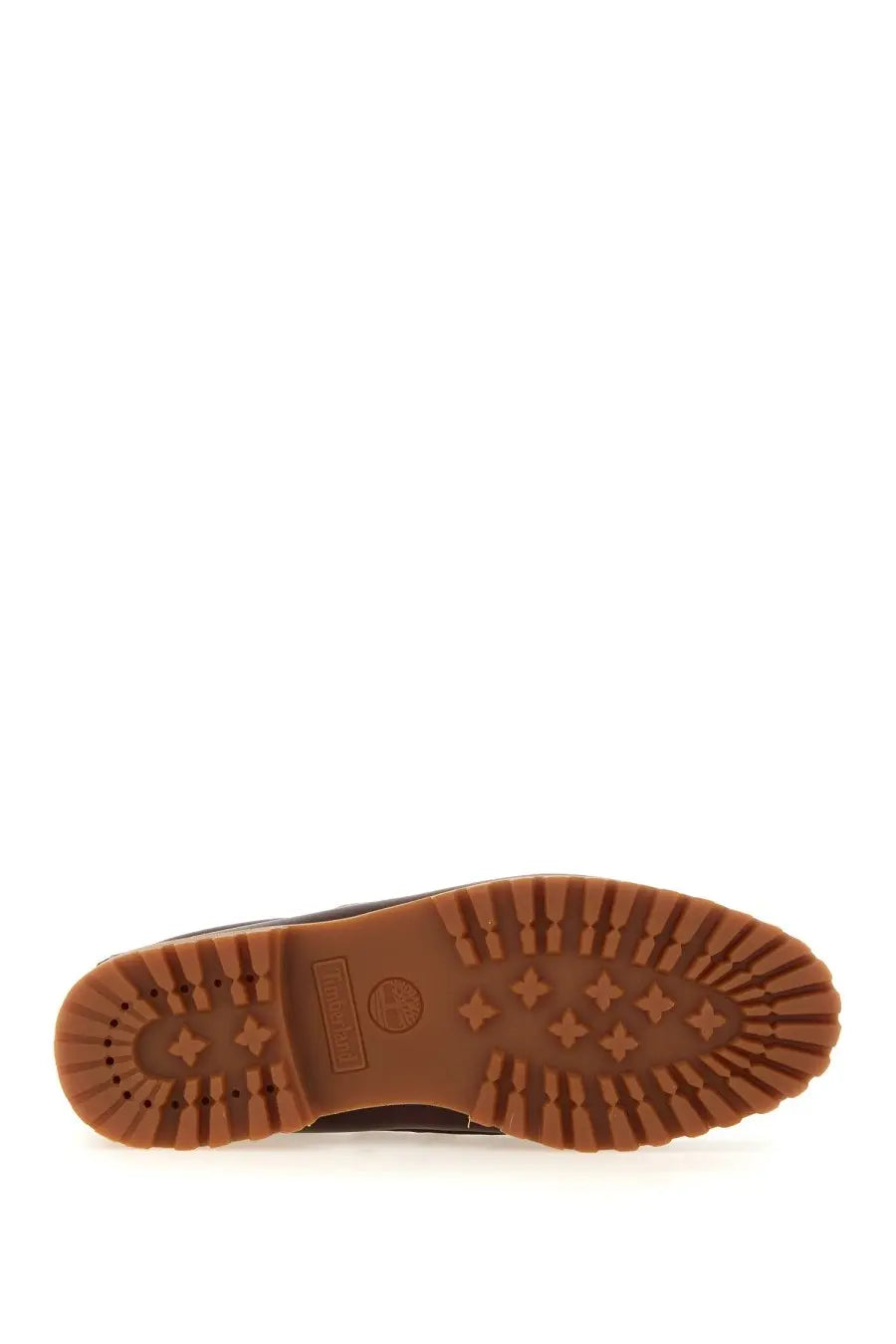 Brown rubber sole with distinctive tread pattern and timberland logo embossed on the heel back of men’s timberland authentic boat moccasin