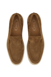 Tod’s men’s leather slipper loafer in brown suede with a light beige rubber sole for casual comfort
