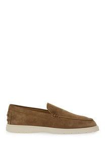 Tan suede Tods men’s leather slipper loafer in brown with white rubber sole and signature brand detail on the heel back view