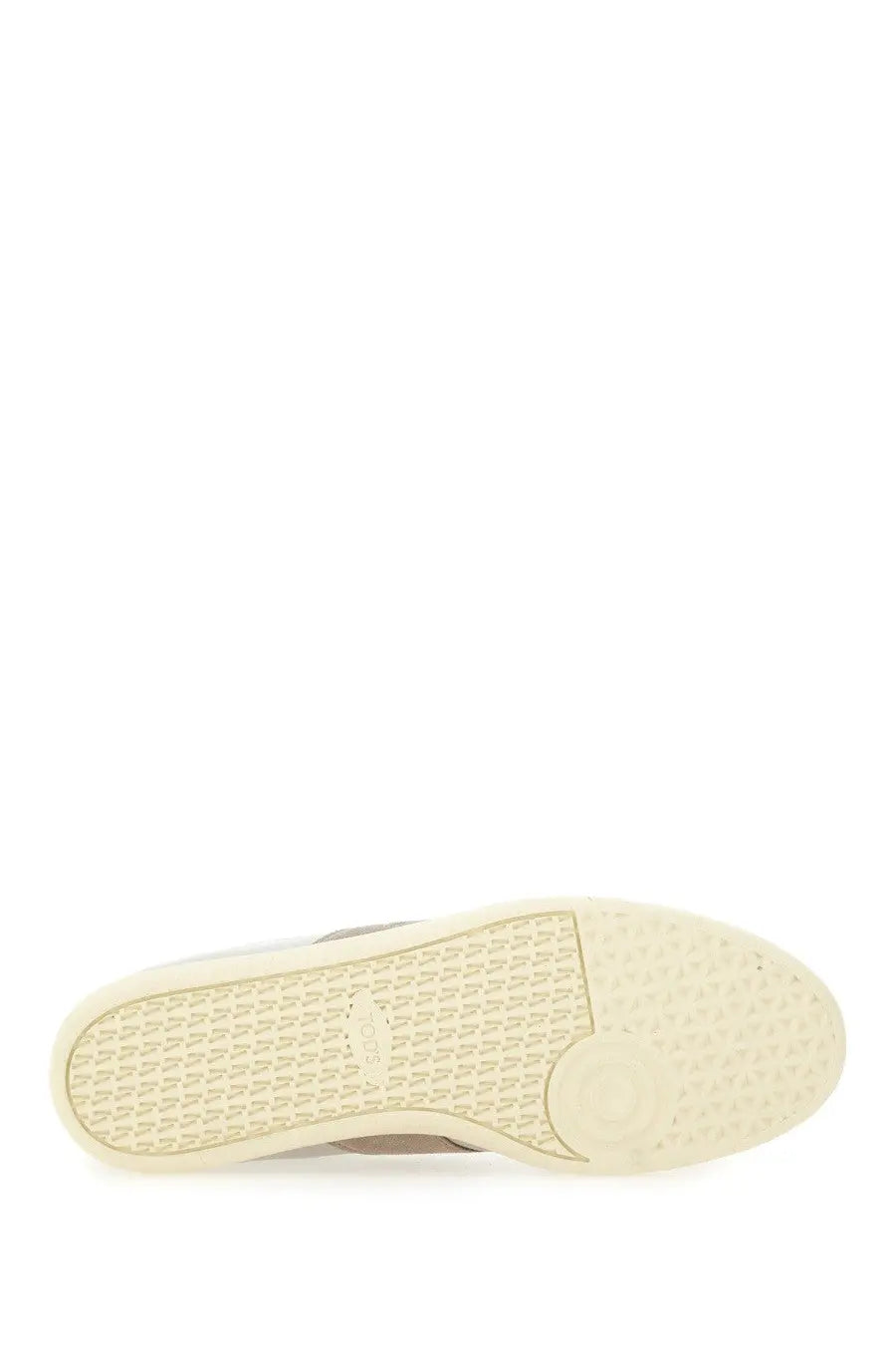 Tod’s men’s tabs sneaker beige with cream-colored rubber sole featuring a textured pattern and subtle branding