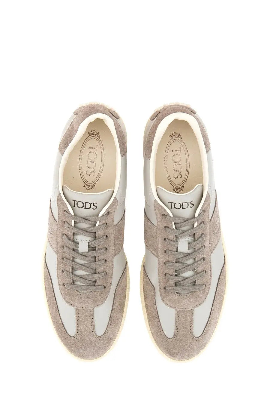 Tod’s men’s tabs sneaker beige low-top sneaker in beige suede and white leather with matching laces
