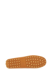 Tod’s women’s leather gommino loafer beige tan driving shoe with textured rubber sole and circular studs