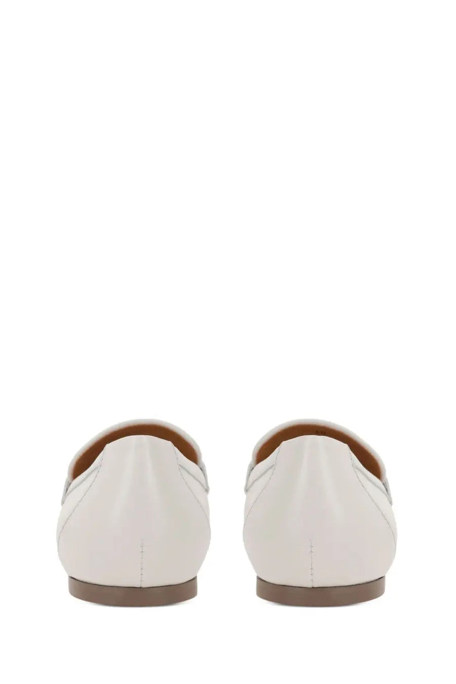 Tod’s women’s mocassino in pelle white leather loafers with sleek minimalist design and contrasting brown soles