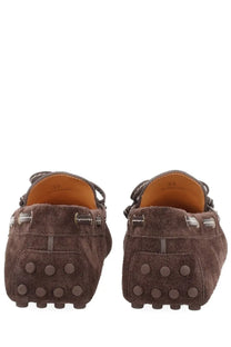 Tod’s women’s mocassino brown suede loafers with classic moccasin design white stitching and rubber sole circular tread
