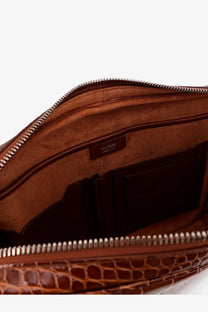 Tom Ford men’s croco print leather laptop pouch in beige with brown crocodile-embossed clutch and silver zipper