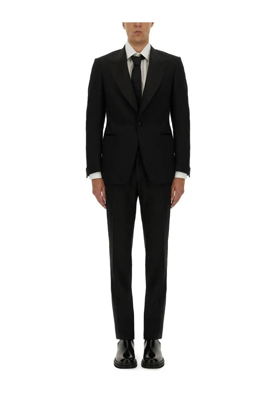 Tom Ford Men’s Shelton Dress black tailored suit with two-button jacket and matching trousers worn over white shirt and black tie