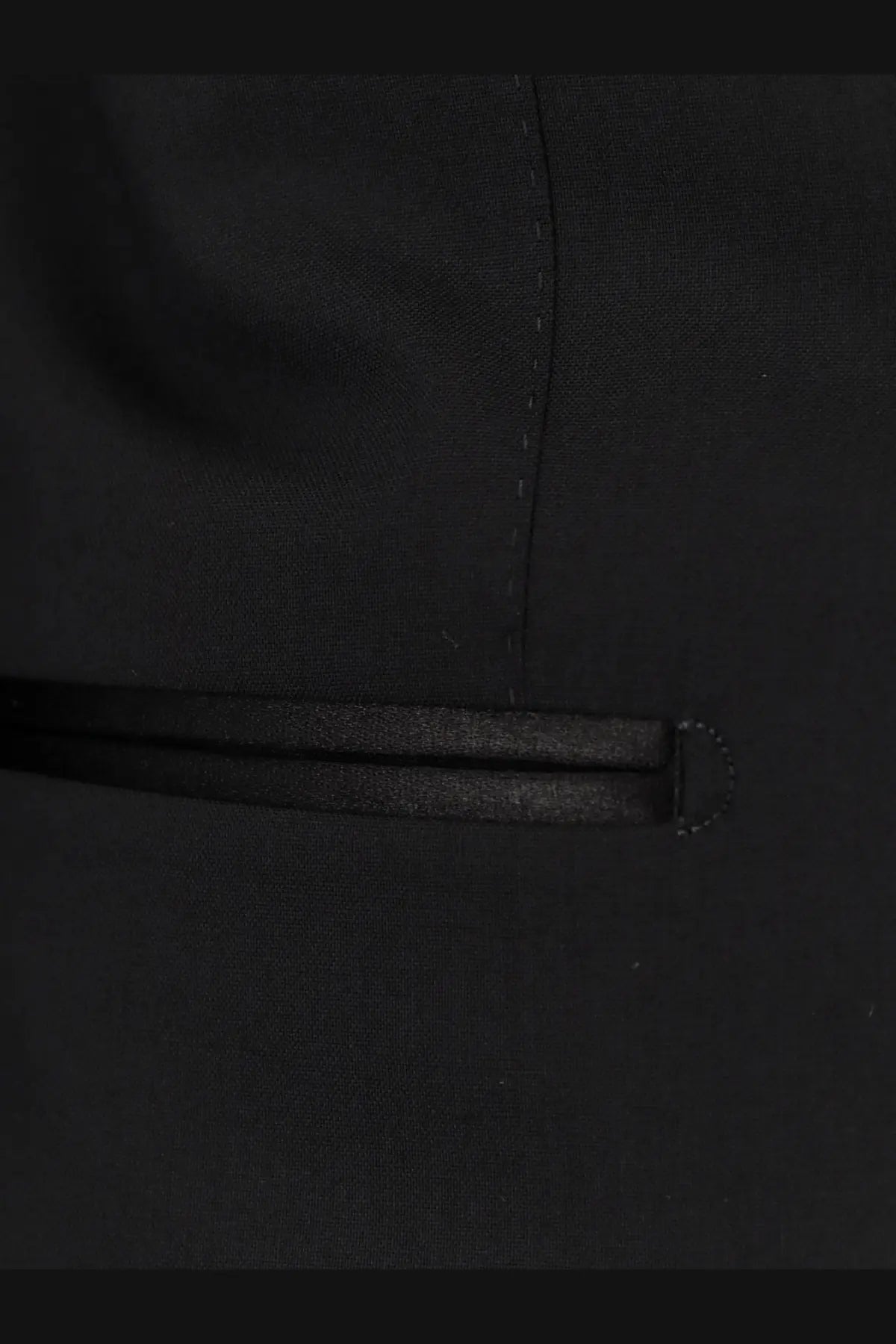 Black zipper pull with textured matte finish on tom ford men’s shelton wool tuxedo black