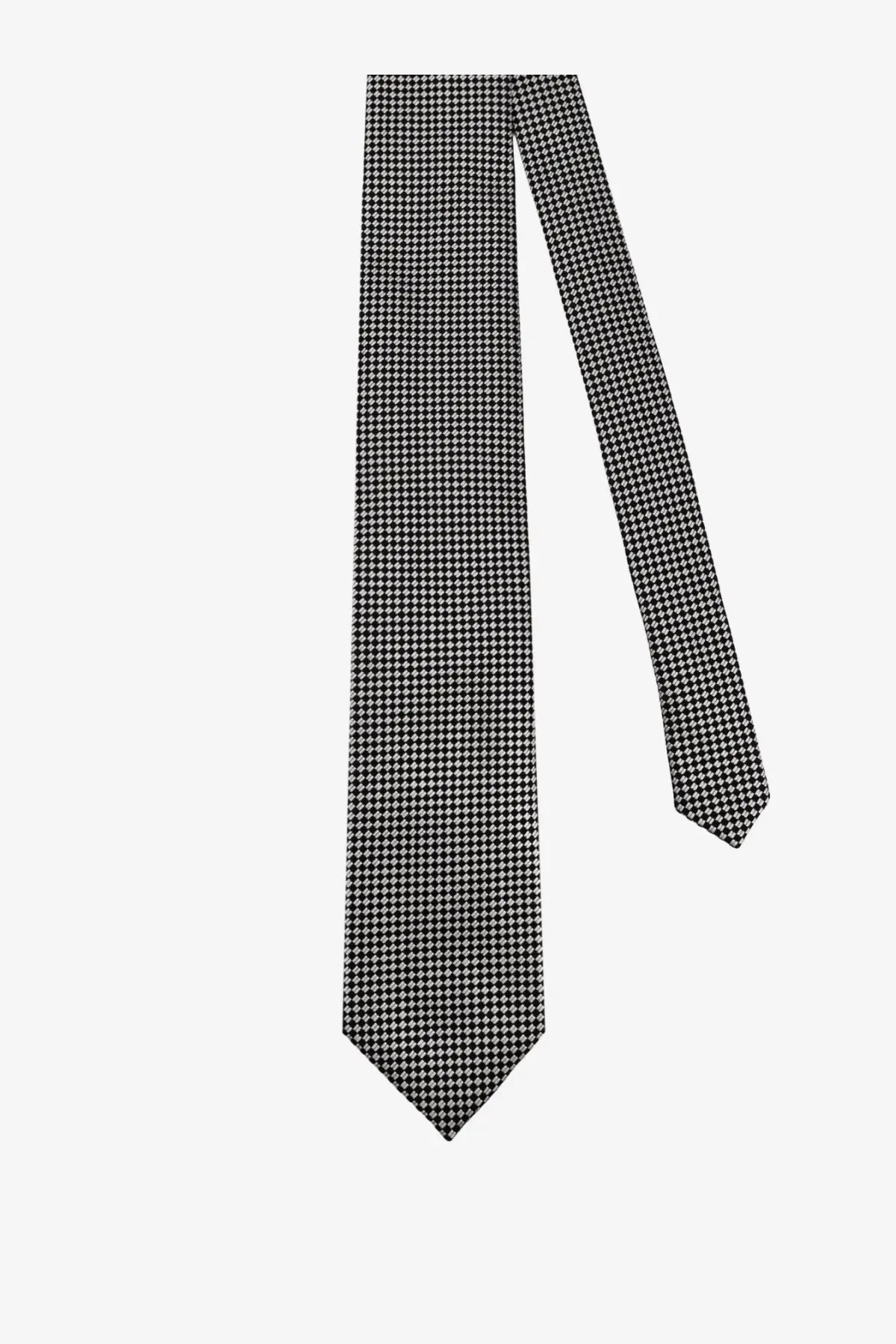Tom Ford men’s silk tie silver featuring a classic black and white houndstooth pattern with a sharp pointed tip