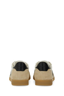 Beige suede tom ford men’s terence sneakers with black rubber heel tabs and gum-colored soles shown from back side