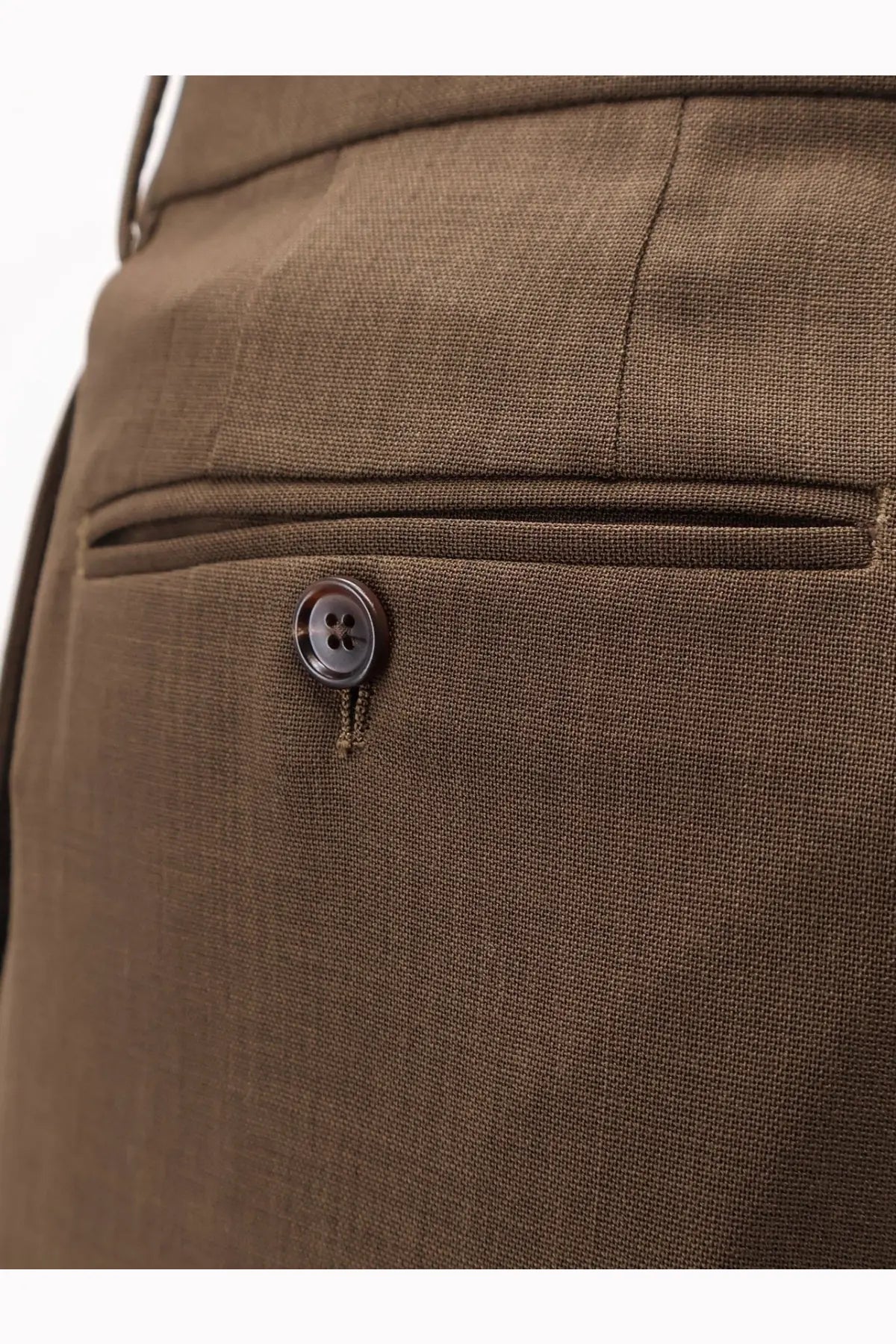 Tom ford men’s brown wool trousers with subtle textured weave and dark brown button on the front pocket
