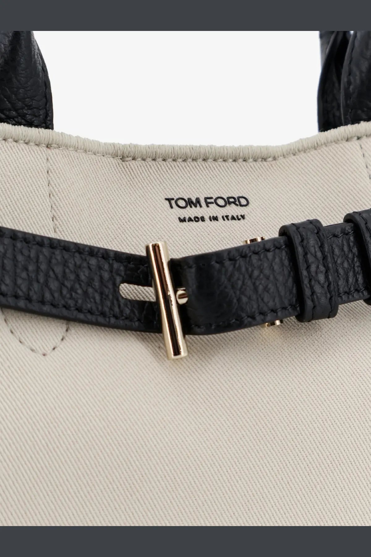 Tom Ford women’s Audrey canvas handbag black with black leather strap gold-tone t-bar buckle and made in Italy interior