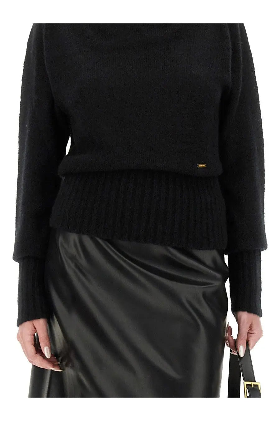 Tom Ford women’s black ribbed knit boat neck sweater with cropped silhouette and gold brand tag at the hem