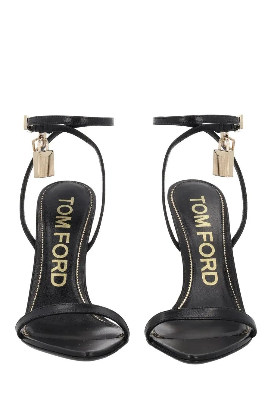 Tom Ford women’s black high-heeled sandals with gold-tone lock charms and sleek minimalist design