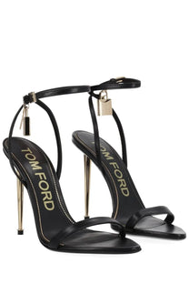 Tom ford women’s heeled sandal black featuring black leather and gold-tone lock and key details on ankle straps