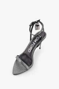 Tom Ford women’s laminated silver metallic sandal with slender heel and ankle strap with padlock charm
