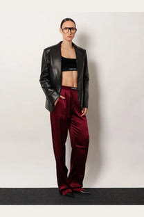 Tom Ford women’s black leather blazer with a sleek structured design and subtle sheen for stylish wear