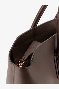 Brown leather tote bag with gold-tone zipper hardware from tom ford womens leather shoulder bag collection