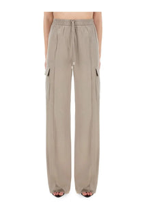 Tom Ford women’s beige wide-leg cargo pants with elastic waistband and drawstring featuring side pockets and relaxed fit