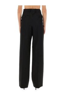 Tom ford women’s sharp wool pants black featuring tailored fit black wide-leg trousers with buttoned front pockets