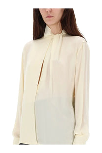 Tom Ford women’s cream-colored silk georgette blouse with high neck and draped front detail