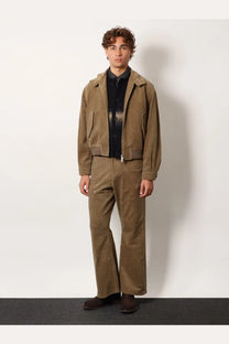 Brown corduroy jacket with vertical stripes and matching trousers paired with tonywack unisex jacquard alpaca cardigan black
