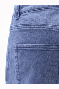 Tonywack women’s blue medium-wash denim jeans featuring classic stitched pocket and belt loop details on back side