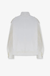Tonywack women’s oversized white denim jacket with structured shoulders and buttoned cuffs