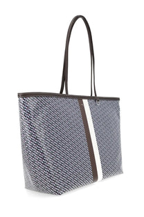 Tory Burch women’s tote bag in racer blue with gray and white geometric pattern and brown leather trim