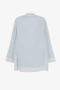 Tory Burch womens cotton tory tunic shirt in soft light blue silk with relaxed fit and white trim on cuffs and hem