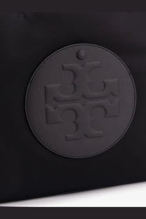 Tory Burch women’s black leather tote bag with circular embossed logo and stitched edges