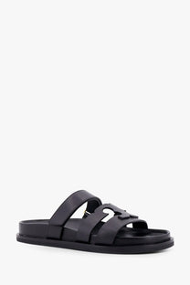 Tory Burch women’s grey leather slide sandal with distinctive cutout design on the strap