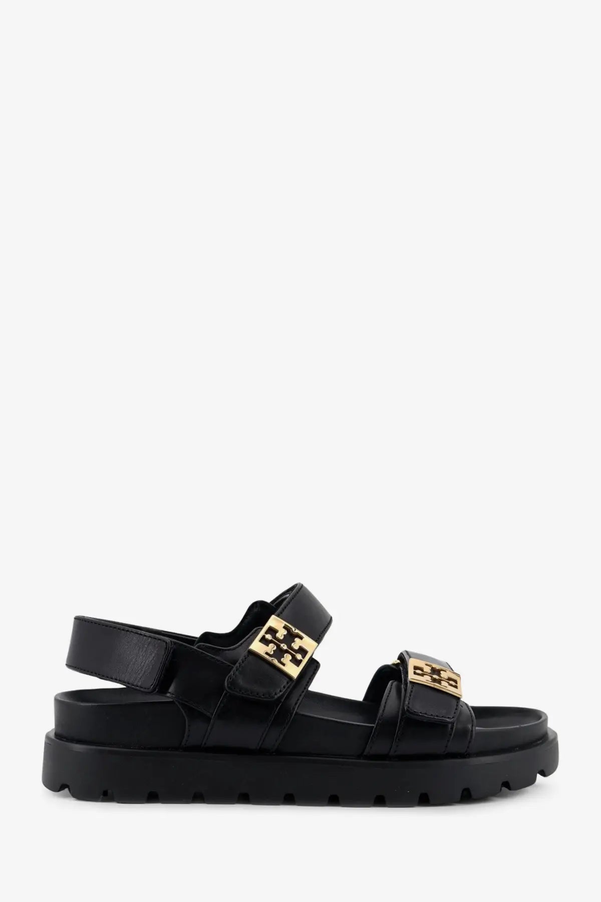 Tory burch women’s mellow leather sandals in black featuring black leather and gold-tone buckle accents