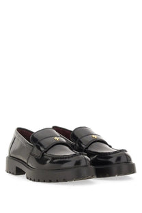 Tory Burch women’s mocassino classico black patent leather loafers with gold-tone logo on the strap