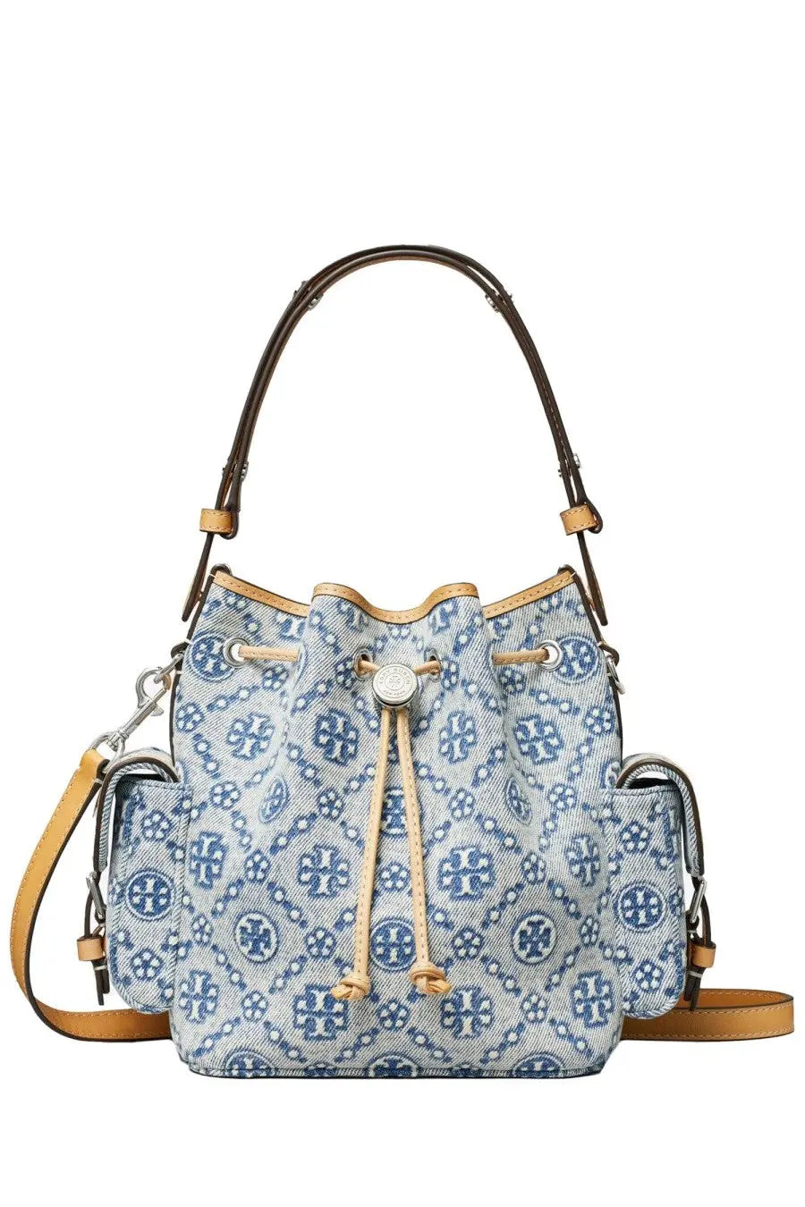Tory Burch women’s monogram bucket bag in blue and white patterned denim with brown leather handles and straps