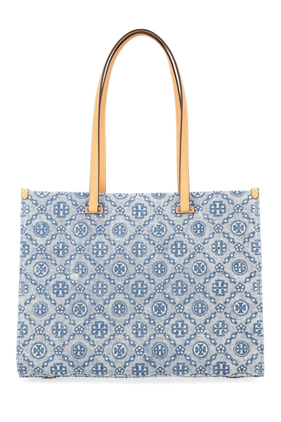 Tory Burch women’s monogram shopper bag in light blue with navy logos, white dots, and tan leather handles