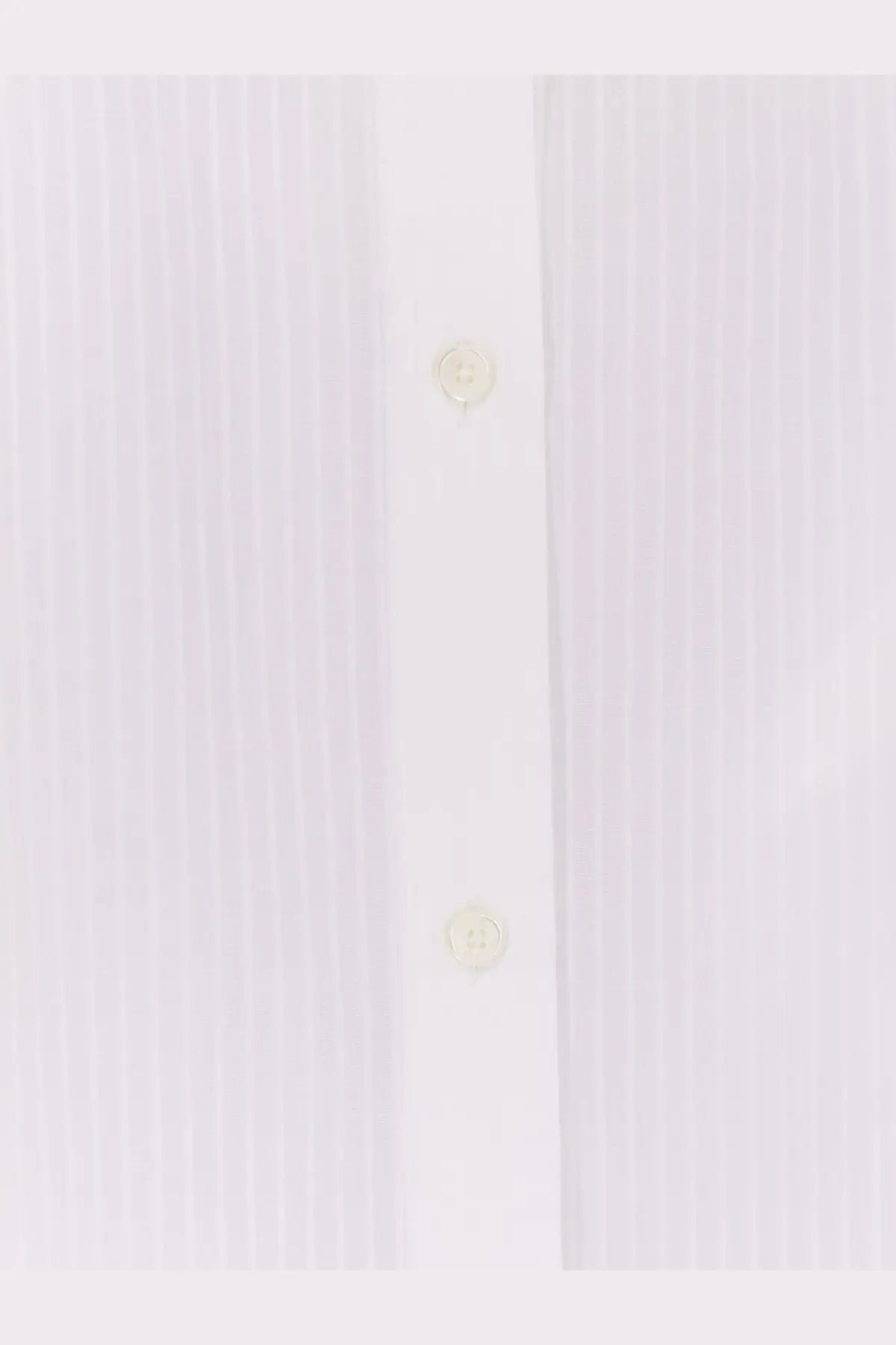 Toteme women’s white cotton button-down shirt with subtle vertical pleats and matching off-white buttons