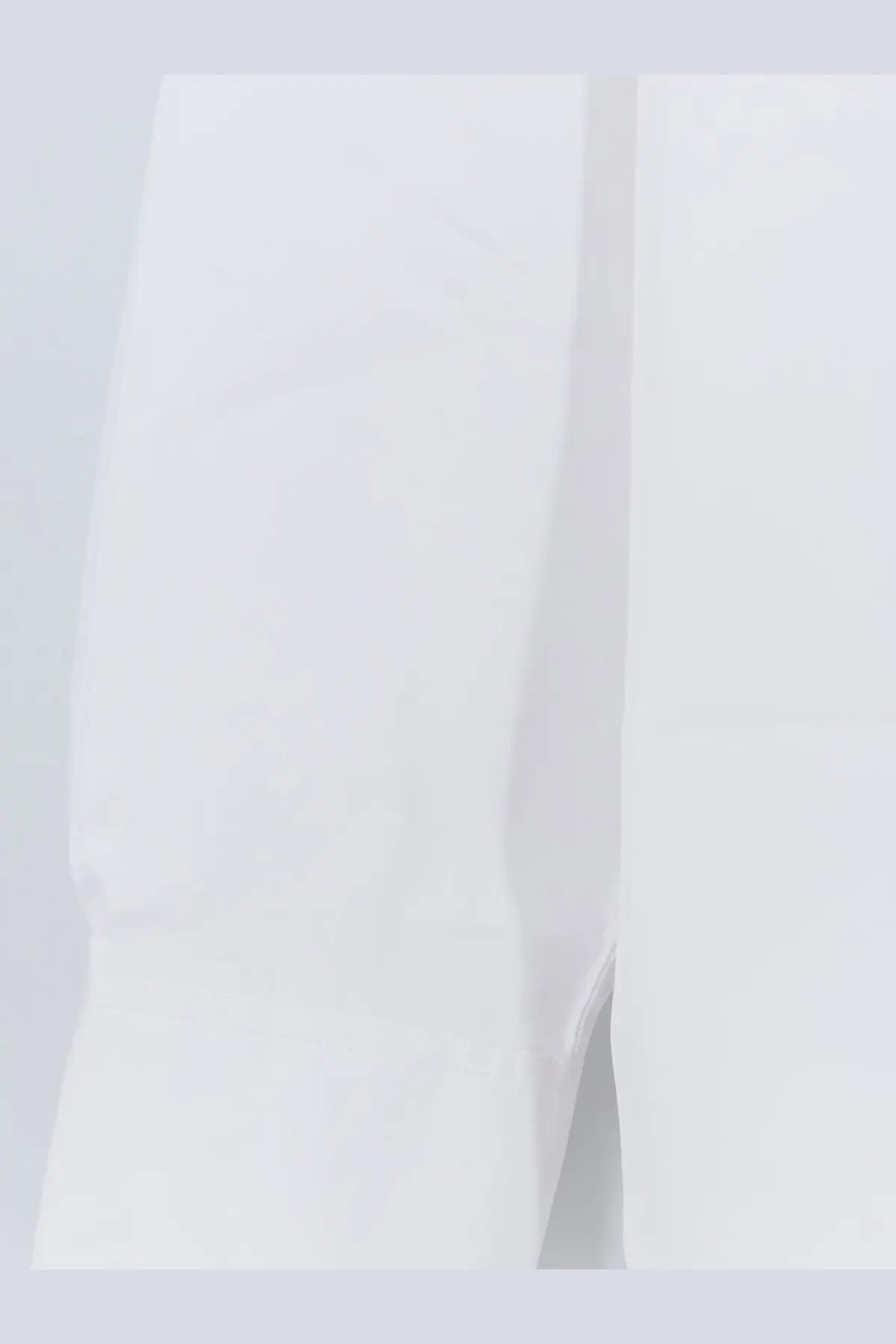 White toteme women’s cotton shirt sleeve with subtle texture and clean seam detail