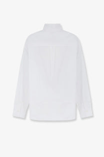 Toteme women’s white cotton shirt with stand collar and subtle pleats shown from the back side