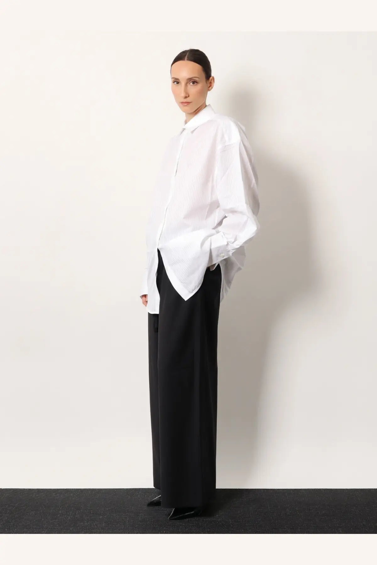 Toteme women’s white oversized cotton shirt with relaxed fit and minimalist design