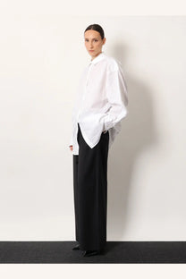 Toteme women’s white oversized cotton shirt with relaxed fit and minimalist design