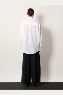 Toteme women’s cotton shirt in white featuring subtle stripes oversized fit clean collar and long sleeves