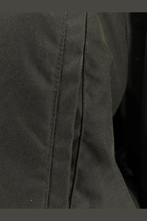 Black toteme women’s country jacket showing detailed stitching on organic cotton fabric seam
