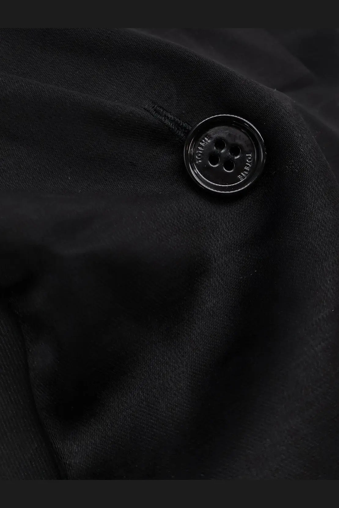Black glossy button with four holes embossed on toteme womens cowl neck viscose and linen shirt black