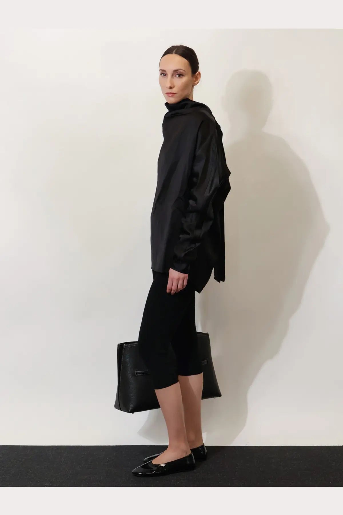 Toteme women’s black satin blouse with high collar loose flowing sleeves made of viscose and linen