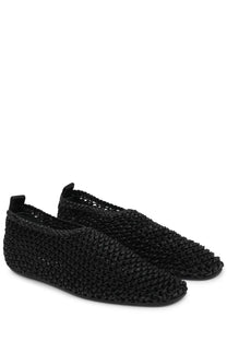 Toteme women’s leather ballerina flats in black with a textured woven interlaced design